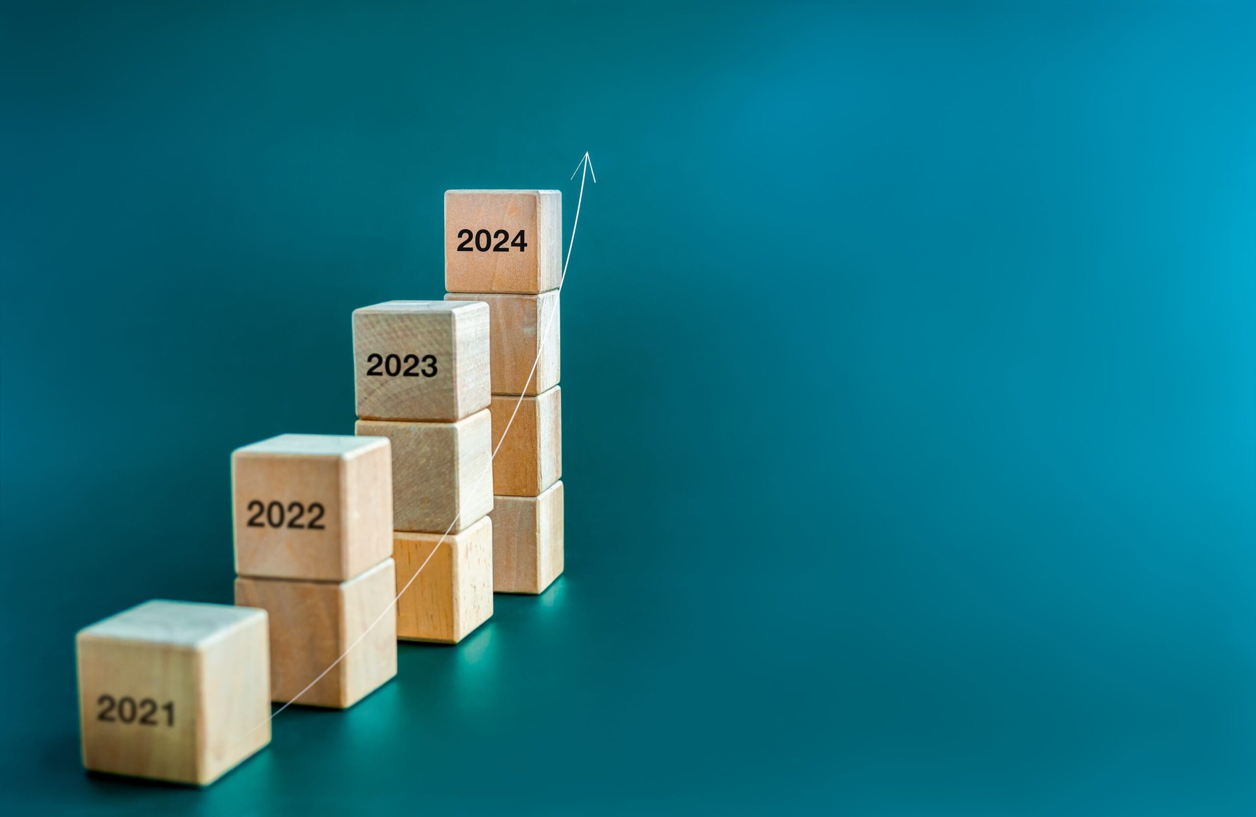 The drivers and far-reaching impacts of medical inflation 7 Small stacks of blocks at ascending heights with the years, 2021-2024 engraved on them to indicate the passage of time.