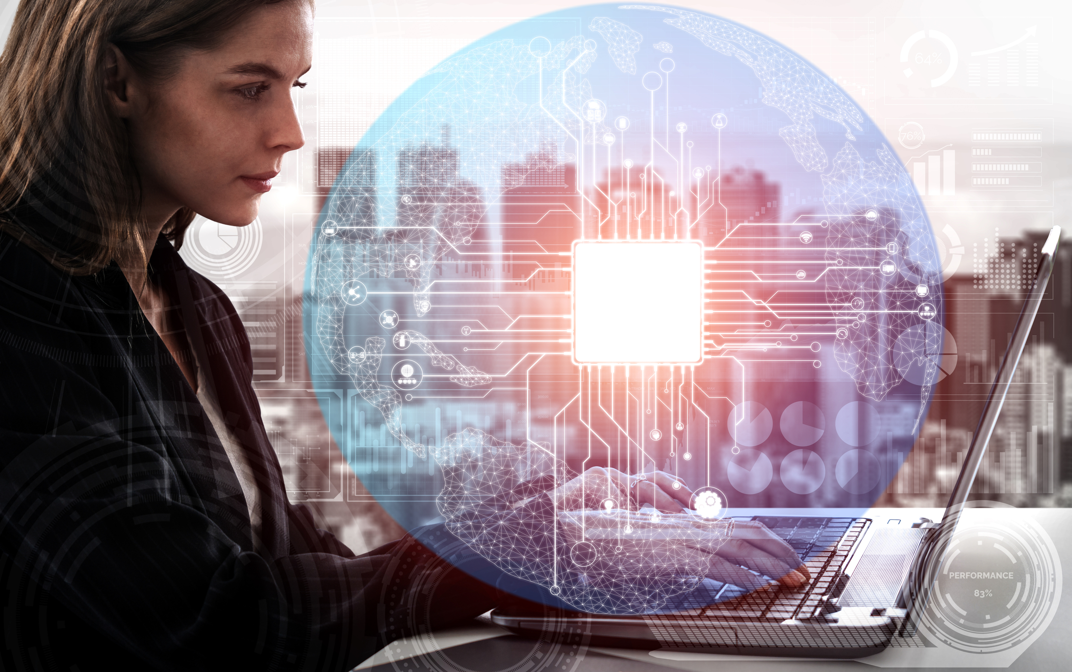Technology 7 A woman typing on a laptop against the background of a large city.