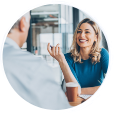 Woman smiling in an interview.