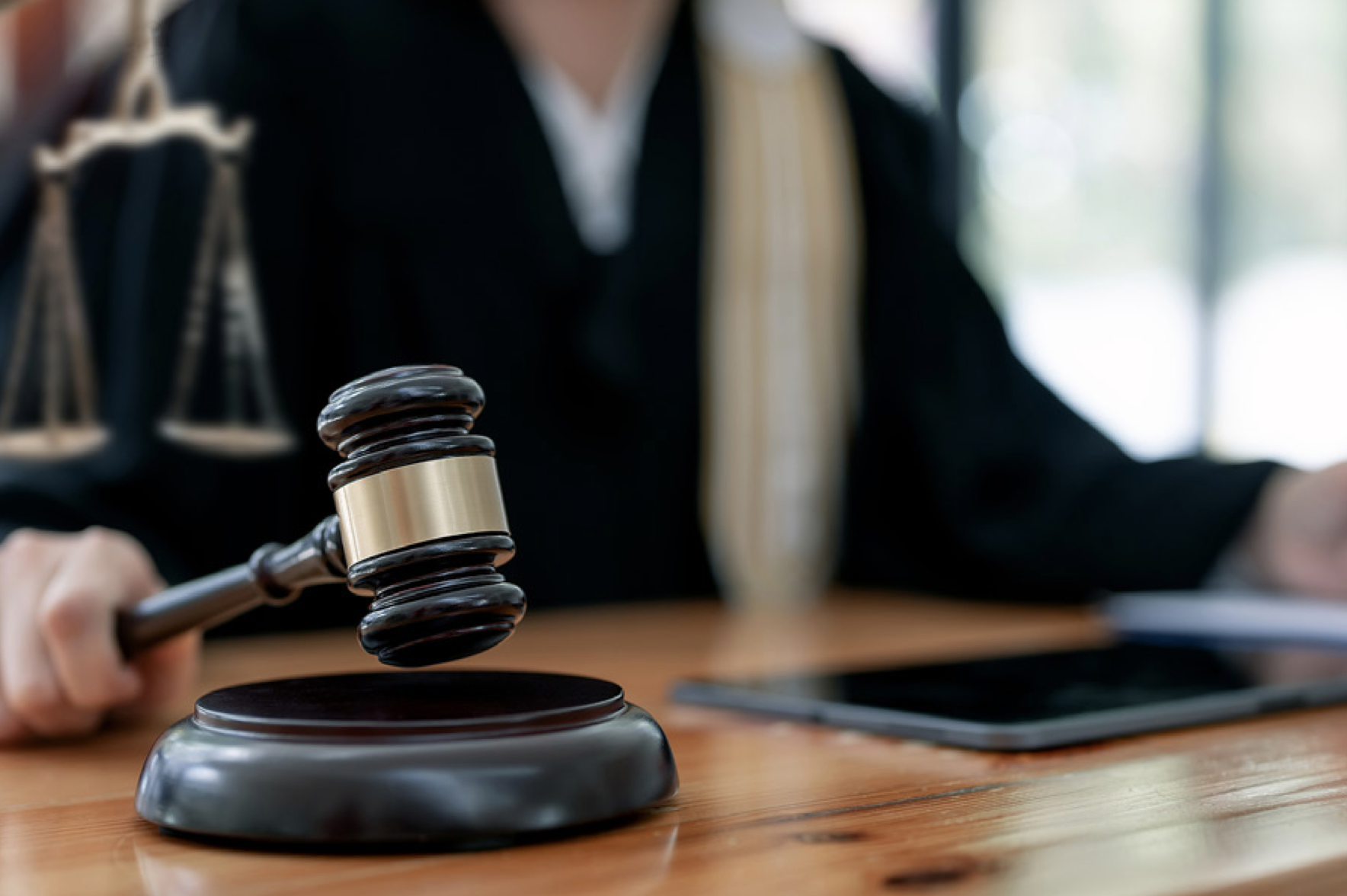 A legal professional with a gavel.
